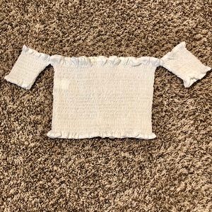 Tight, white, crop top with small sleeves!